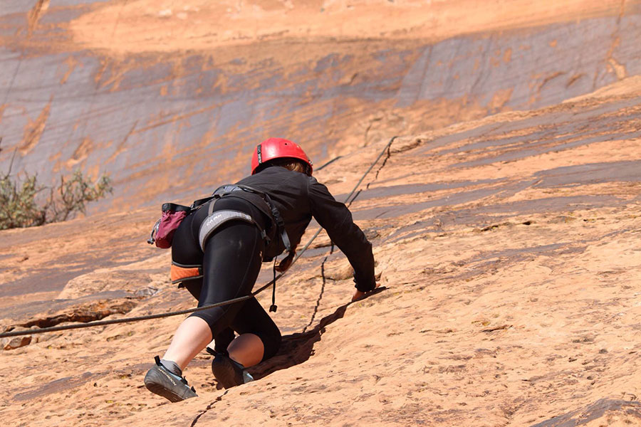 Families Rock Climb while on New Haven Residential Treatment Center's Family Camping Trip to Moab.
