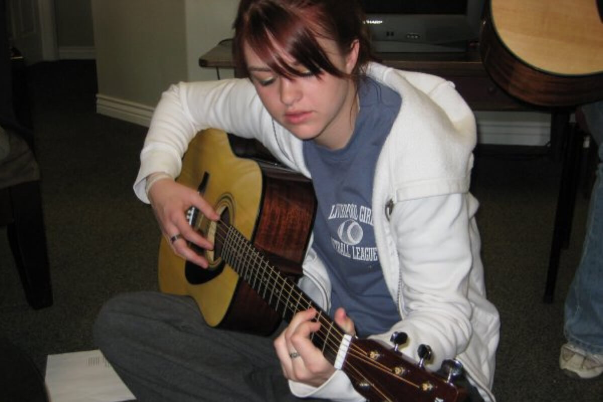 erica-before-with-guitar-landscape